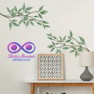 برچسب دیواری طرح شاخه و برگ برای دکور طبیعی و آرامشبخش خانه نصب شده در اتاق نشیمن